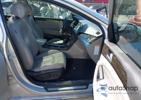 2016 Hyundai Sonata Hybrid Limited z USA, uszkodzony, nr VIN KMHE34L1XGA017347